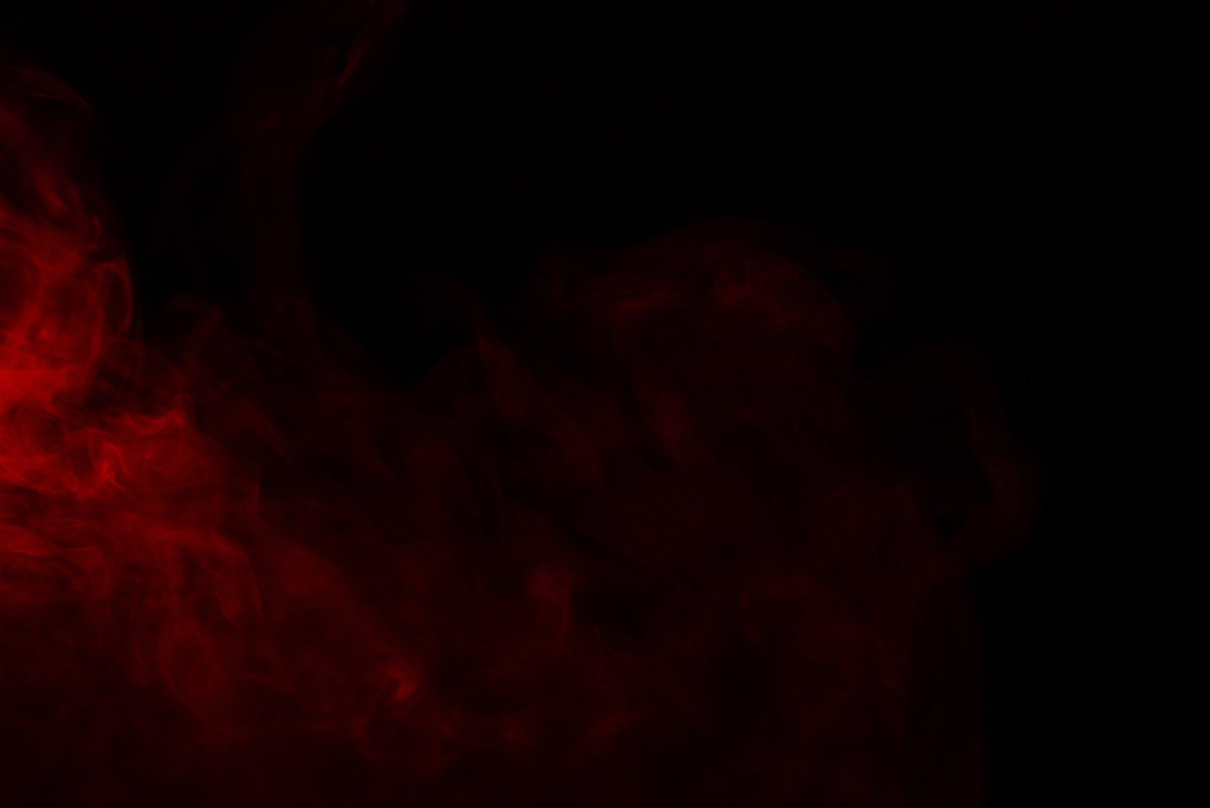 Red steam on a black background.